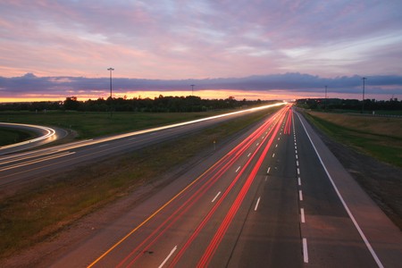 cars-night-blurred-highway-68629.jpg